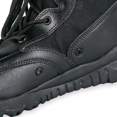 Botas tácticas de media pantorrilla con encaje de cuero impermeable y revestimiento de algodón